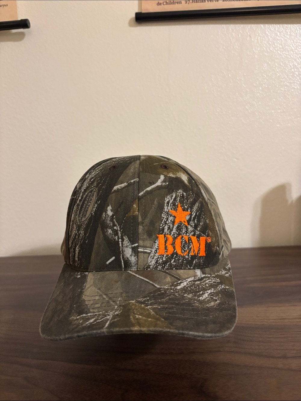 BCM Camo Baseball Hat with Orange Logo